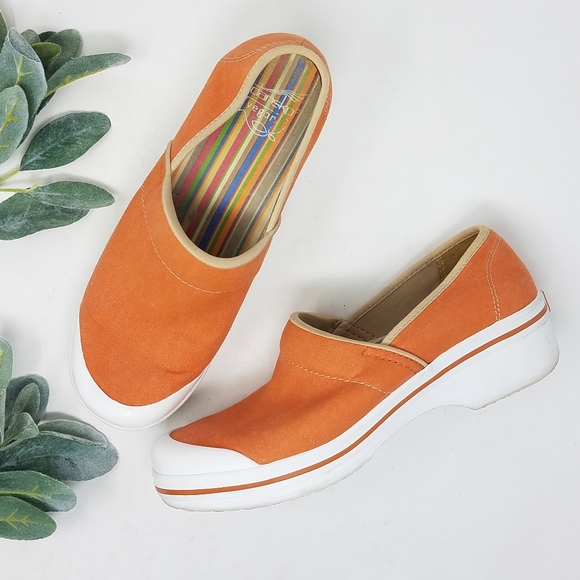 dansko vegan canvas clogs